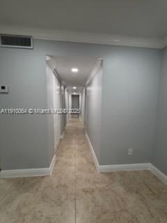 1805 West 56th Street, Unit 412 Hialeah, FL 33012 - Photo 8 of 18 a view of a hallway