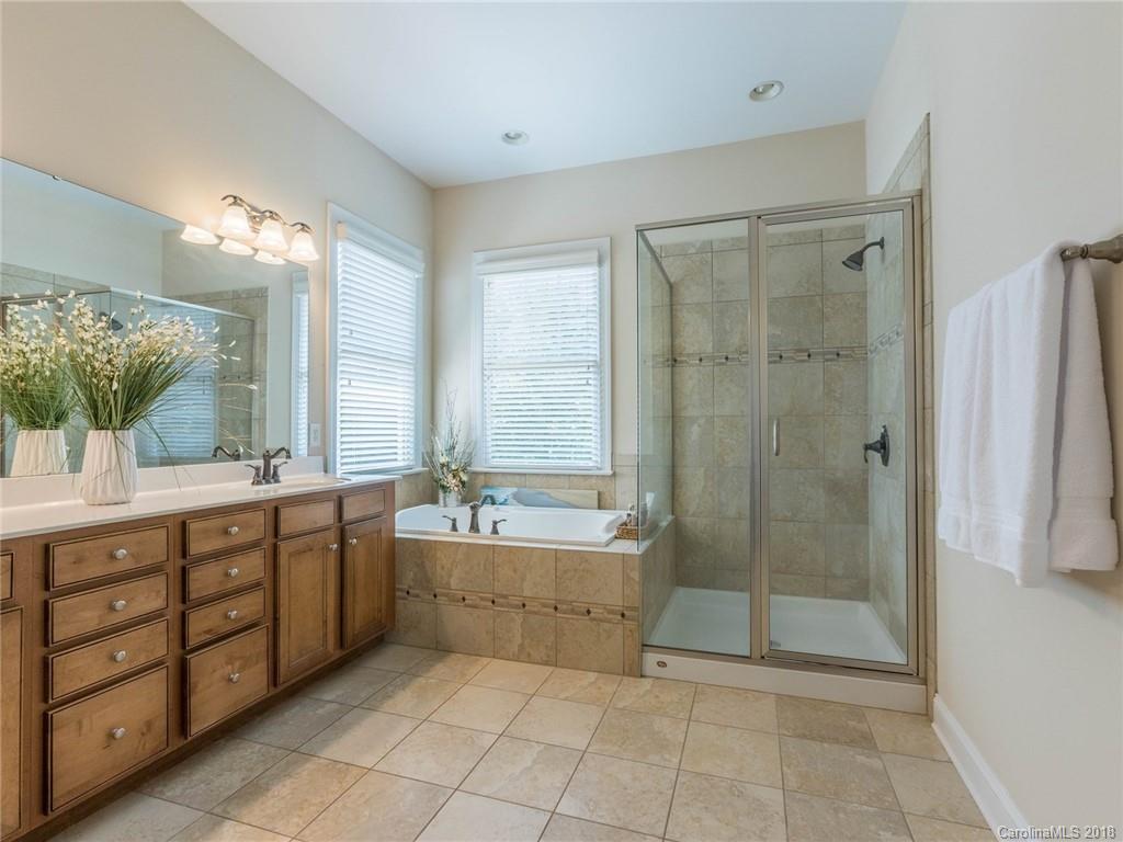 3325 Richard's Crossing Fort Mill, SC 29708 - Photo 22 of 36 a bathroom with double vanity shower and a bathtub