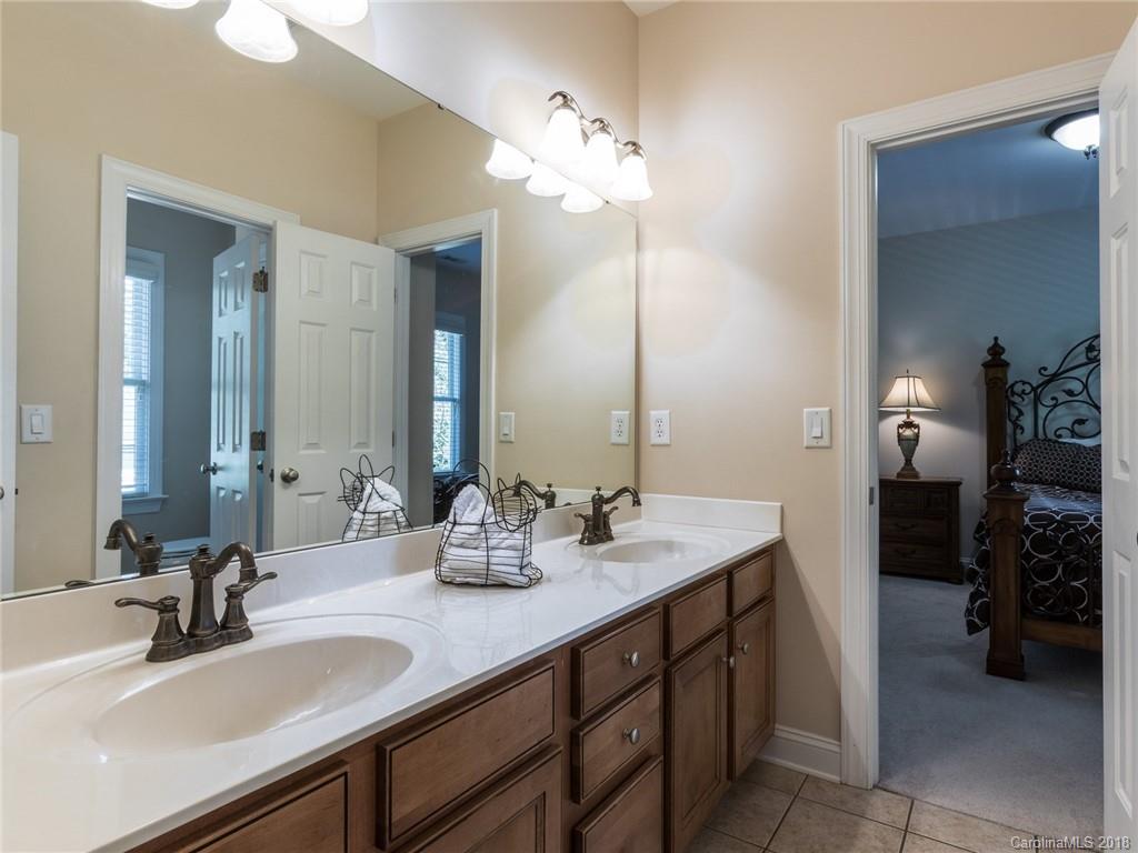 3325 Richard's Crossing Fort Mill, SC 29708 - Photo 29 of 36 a bathroom with a sink and a mirror