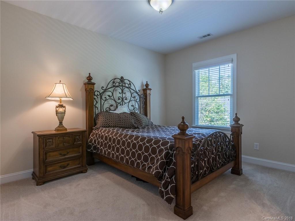 3325 Richard's Crossing Fort Mill, SC 29708 - Photo 30 of 36 a bed sitting in a bedroom next to a window