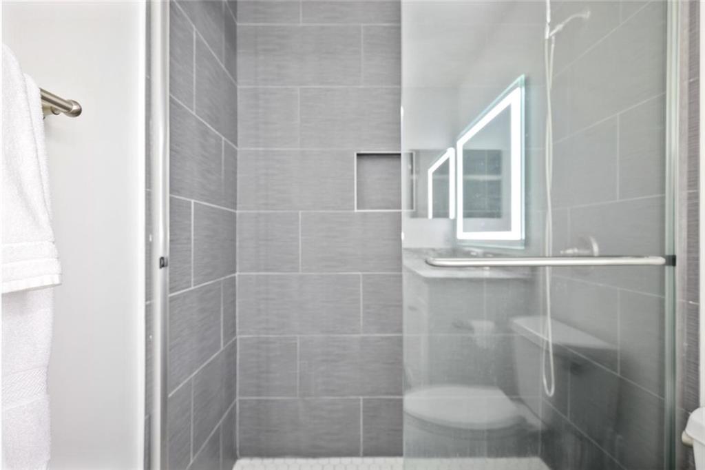 102 Hawkstone Way Alpharetta, GA 30022 - Photo 18 of 22 a bathroom with a shower