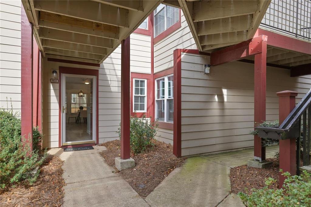 102 Hawkstone Way Alpharetta, GA 30022 - Photo 20 of 22 a view of a house with a yard and stairs