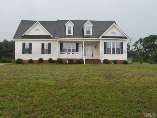 5939 Sandford Road Wilson, NC 27896 - Photo 1 of 10 a front view of a house with a yard