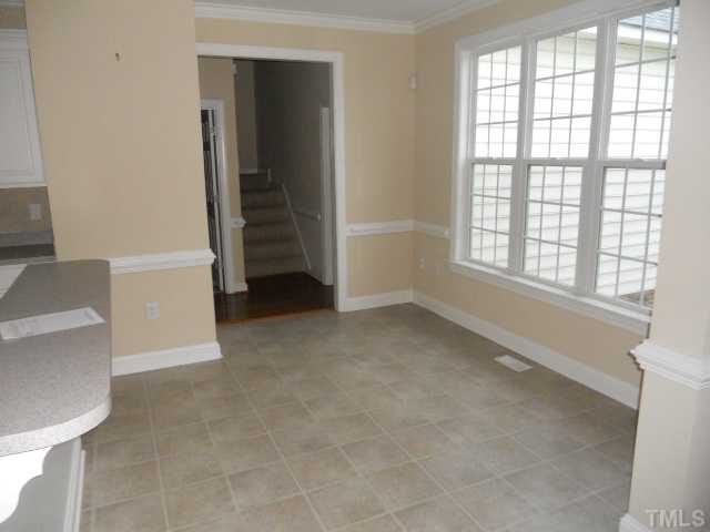 5939 Sandford Road Wilson, NC 27896 - Photo 4 of 10 a view of an empty room with a window