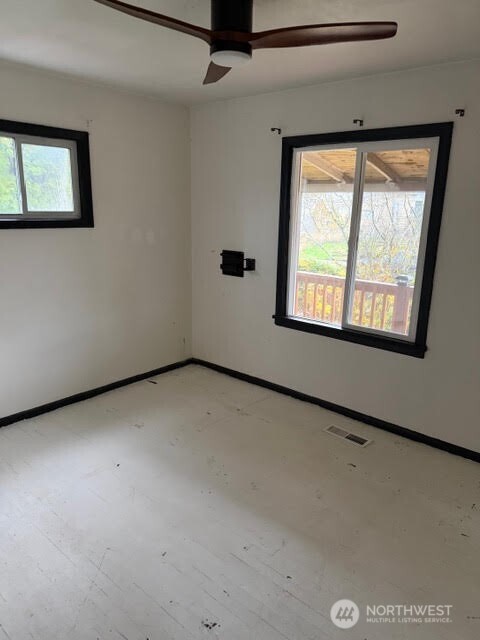 3715 Spokane Street Tacoma, WA 98404 - Photo 12 of 22 a view of a window in an empty room