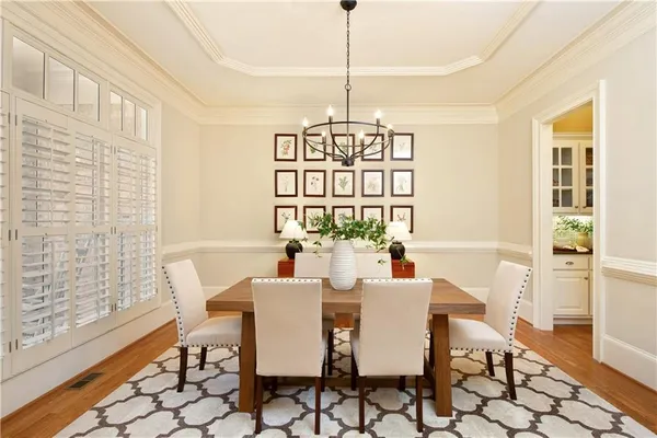 a living room with furniture a window and a fireplace