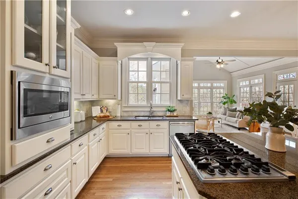 a bedroom with a bed and ceiling fan