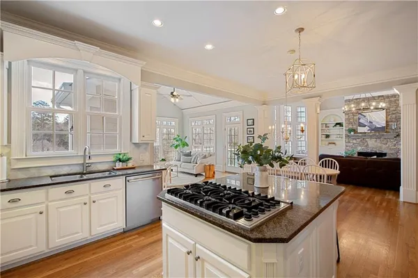 a living room with furniture fireplace and a flat screen tv