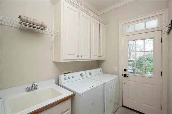 a bathroom with a granite countertop sink toilet and a mirror