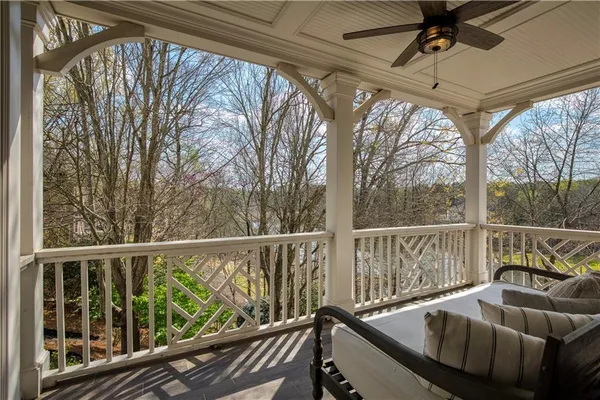 a view of a lake with houses in the back