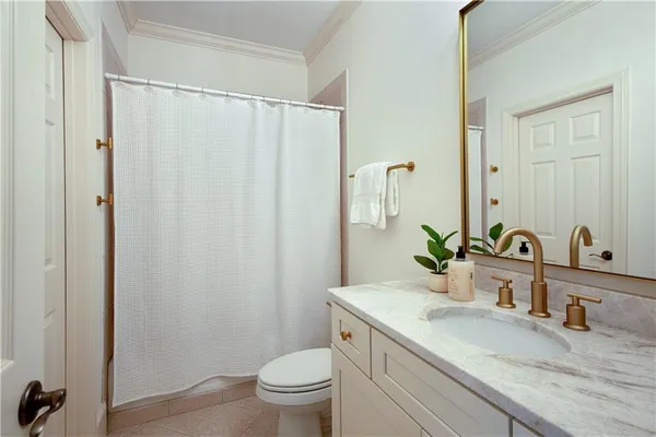 an aerial view of a house with a garden
