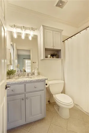 a view of a golf course with a lake view