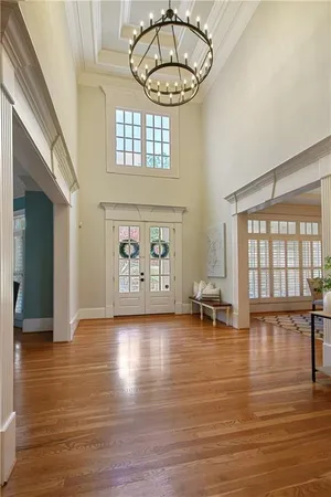 a kitchen with stove a sink and cabinets