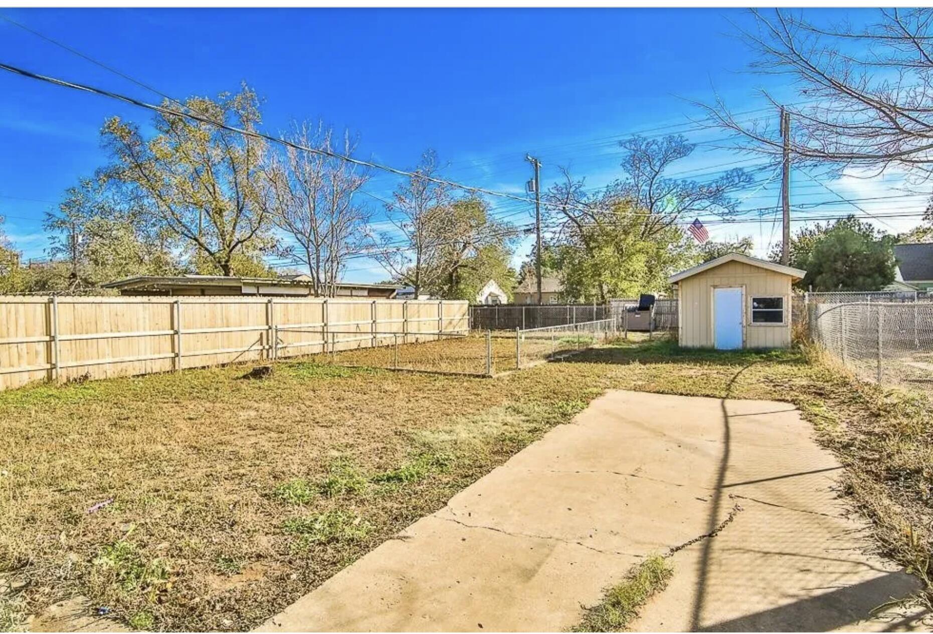 1913 27th Street Lubbock, TX 79411 - Photo 12 of 12 a view of a backyard