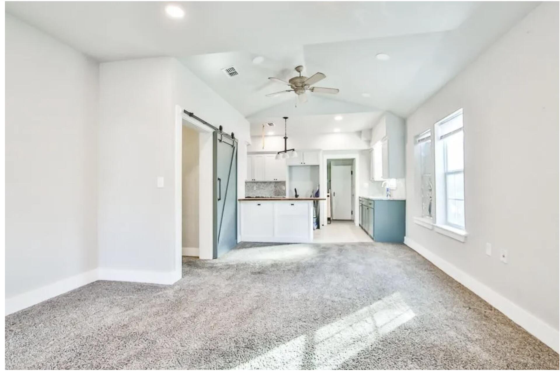 1913 27th Street Lubbock, TX 79411 - Photo 5 of 12 a view of a kitchen with wooden floor and a kitchen