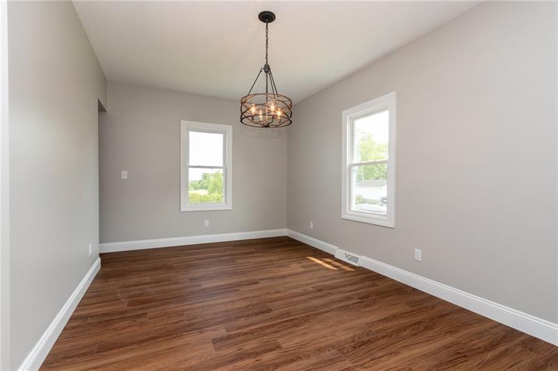 2160 Brodhead Road Aliquippa, PA 15001 - Photo 6 of 19 Trendy lighting & an alcove lend style and space to the dining room.
