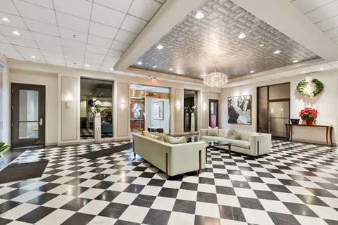 a view of building with sitting area