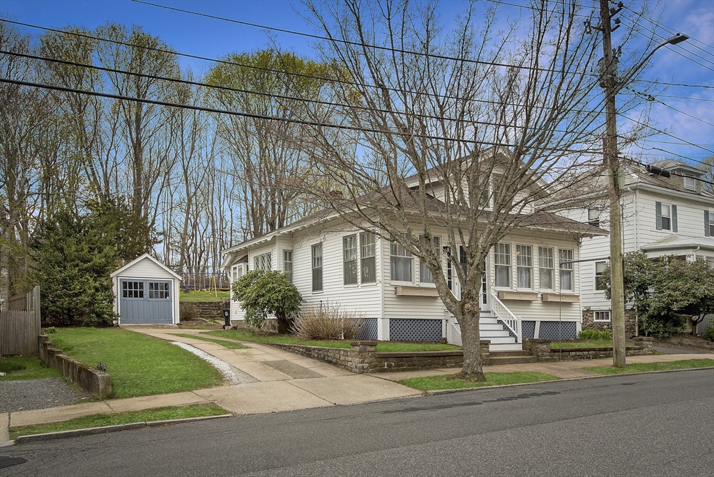 9 Pickman Road Salem, MA 01970 - Photo 3 of 31 a front view of a house with a garden