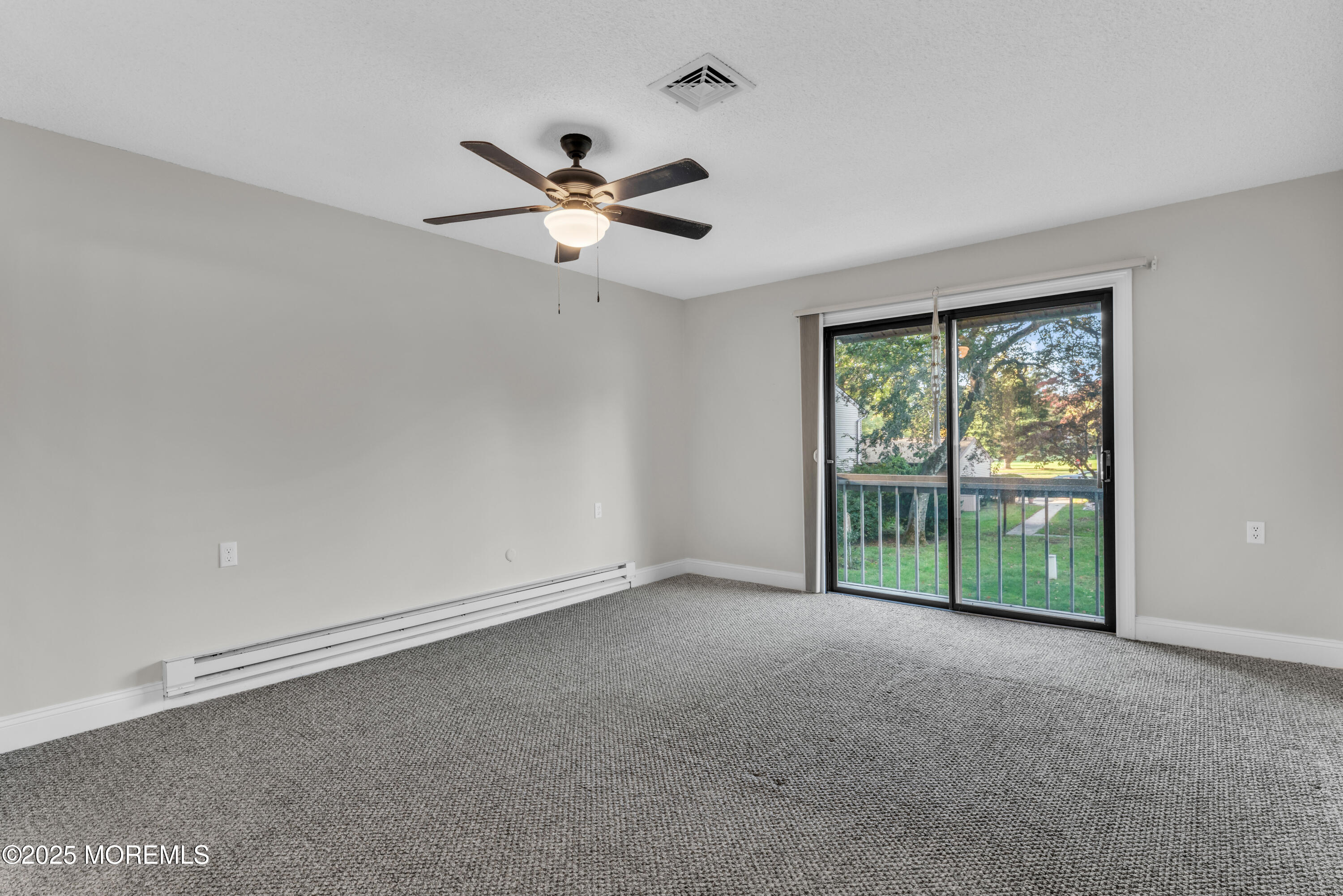 33 Auburn Court Red Bank, NJ 07701 - Photo 12 of 23 a view of room with window and ceiling fan