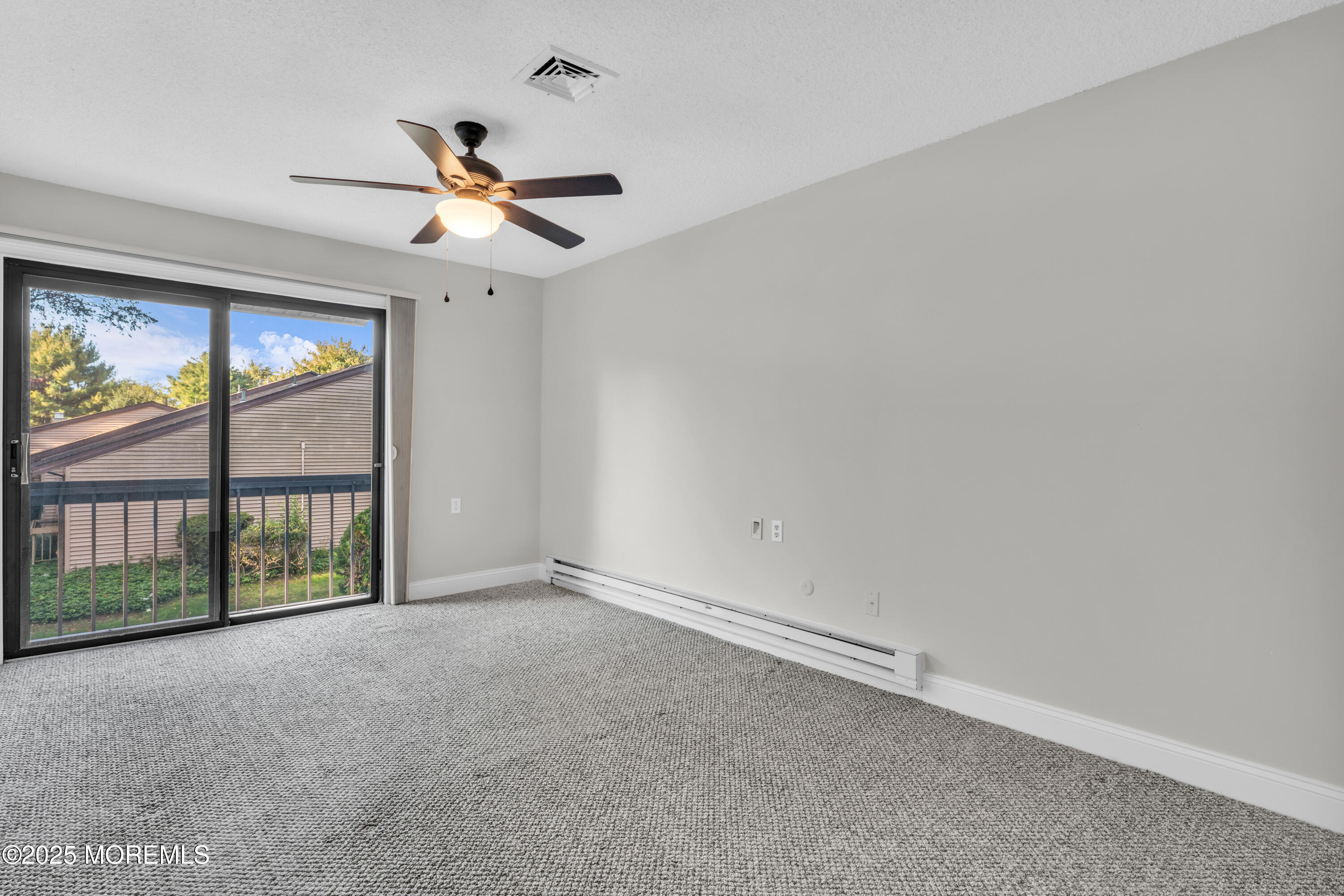 33 Auburn Court Red Bank, NJ 07701 - Photo 17 of 23 wooden floor in an empty room with a window