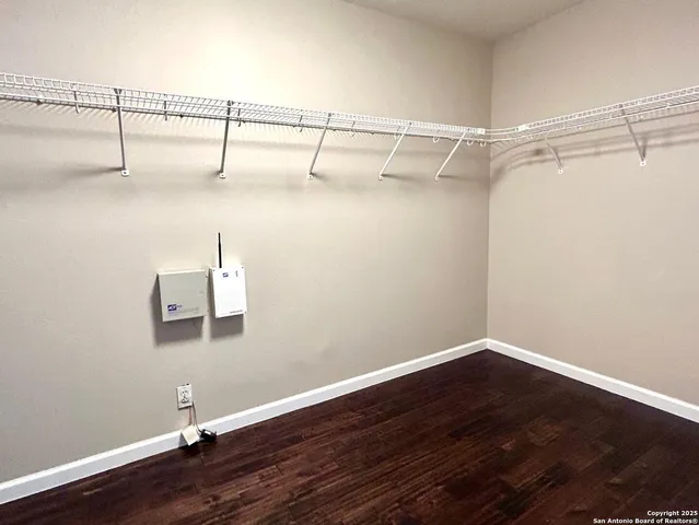 a view of a room with racks on the wall