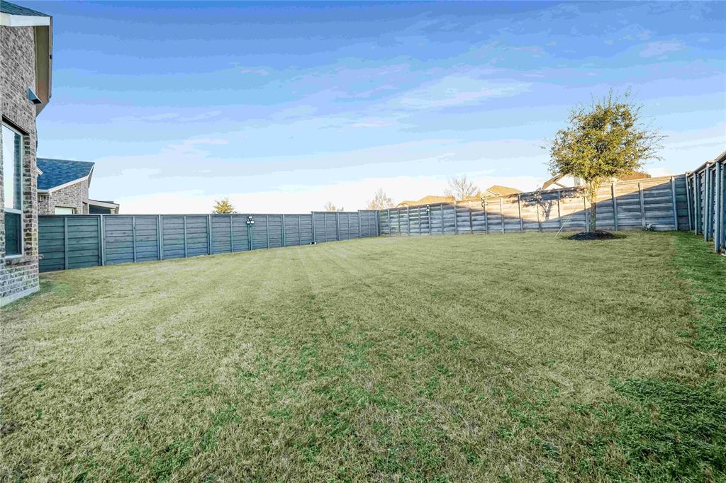 7024 Green Field Street Little Elm, TX 76227 - Photo 21 of 27 a view of outdoor space and yard