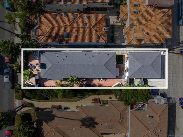 an outdoor space with lots of fruit and vegetables