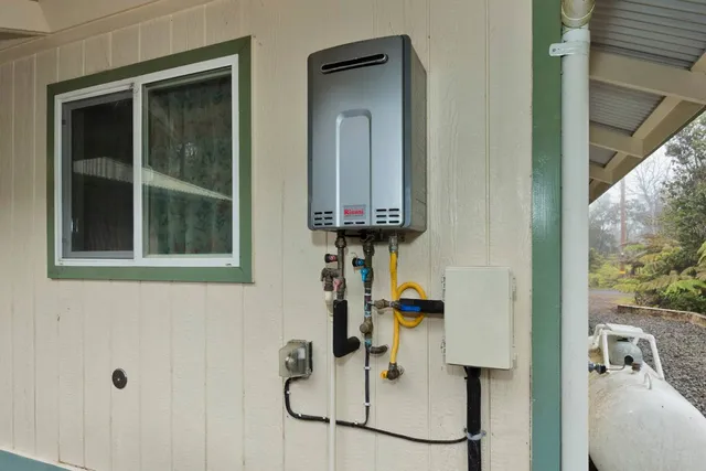 a hallway with table mirror and window