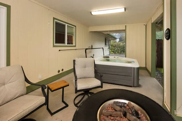 a bathroom with a sink toilet and mirror