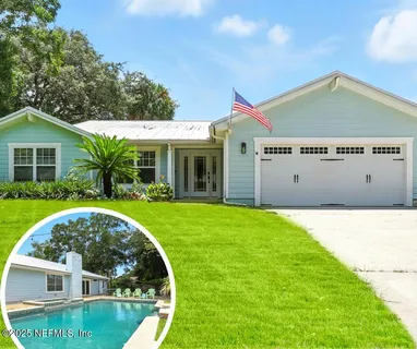 a view of a house with a swimming pool