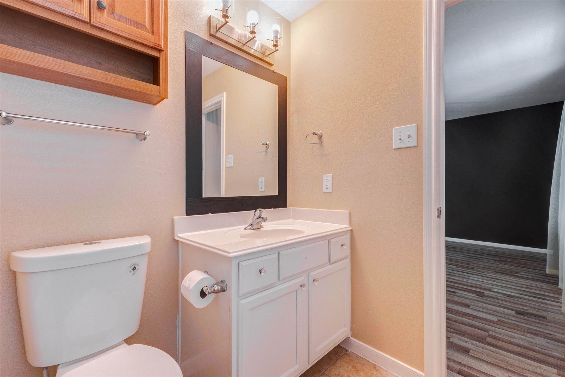 14522 Durham Chase Lane Houston, TX 77095 - Photo 29 of 40 a bathroom with a toilet a sink and a mirror