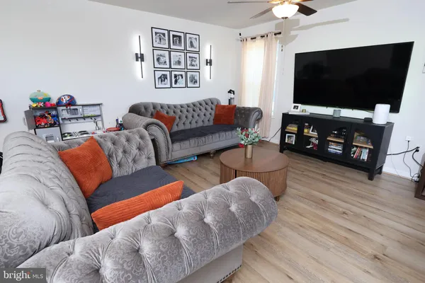 a bathroom with a sink and a window