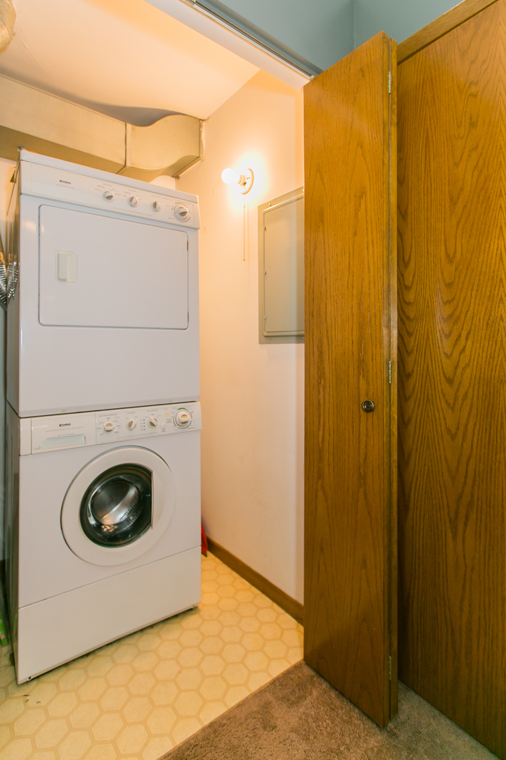 1903 West Golf Road, Unit 2A Mount Prospect, IL 60056 - Photo 14 of 20 a utility room with dryer and washer