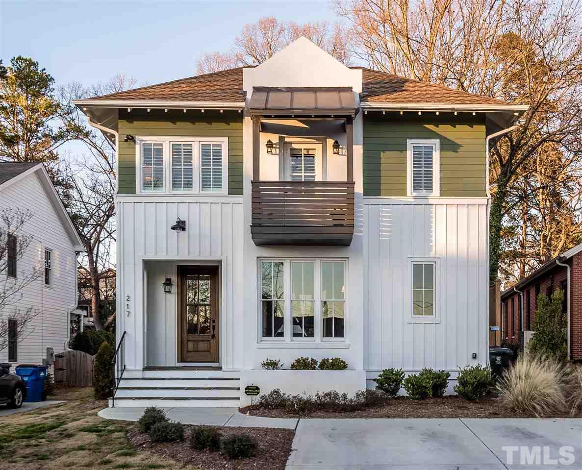 217 Georgetown Road Raleigh, NC 27608 - Photo 1 of 25 a front view of a house with a yard