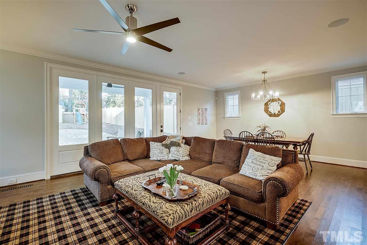 217 Georgetown Road Raleigh, NC 27608 - Photo 13 of 25 a living room with furniture and a rug