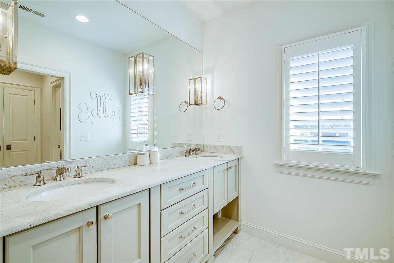 217 Georgetown Road Raleigh, NC 27608 - Photo 15 of 25 a bathroom with a granite countertop sink and a mirror