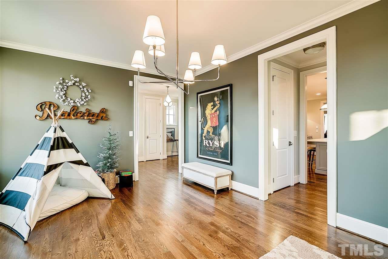 217 Georgetown Road Raleigh, NC 27608 - Photo 4 of 25 a view of an entryway with wooden floor