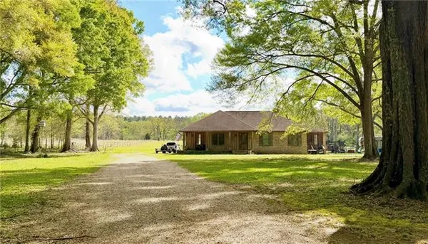 $350,000 | 67556 South River Road, Kentwood, LA 70444