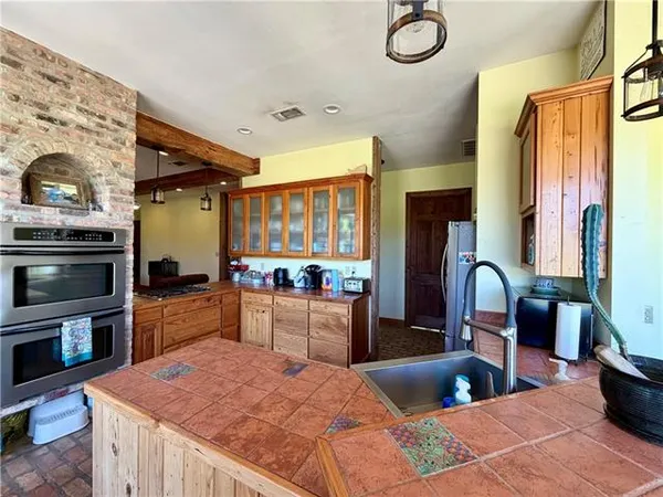 $350,000 | 67556 South River Road, Kentwood, LA 70444