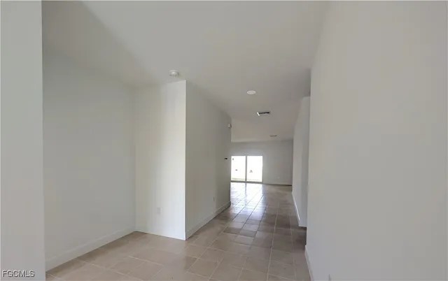 a view of a house with a yard and garage