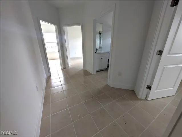 a picture of a bathroom with a shower