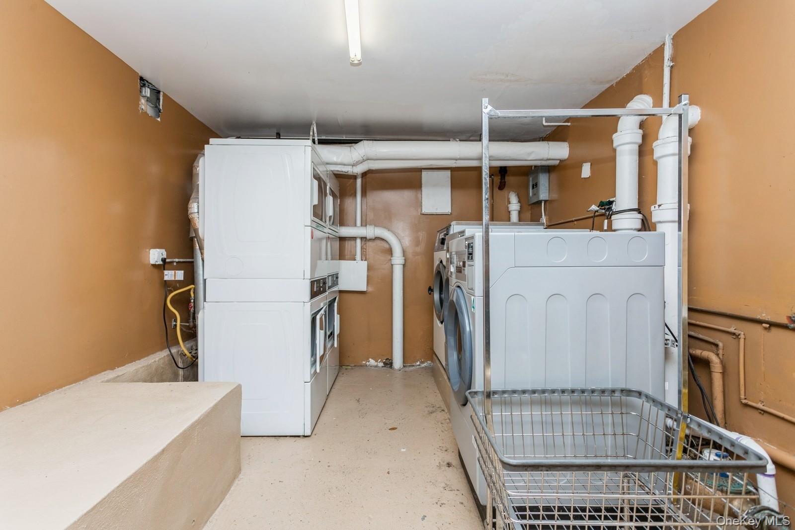 51 Cross Street, Unit 3A Yonkers, NY 10708 - Photo 15 of 17 Washroom featuring washer and clothes dryer