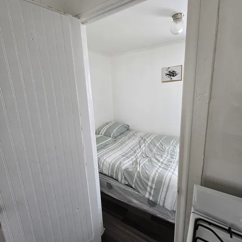 a bathroom with a toilet and a sink