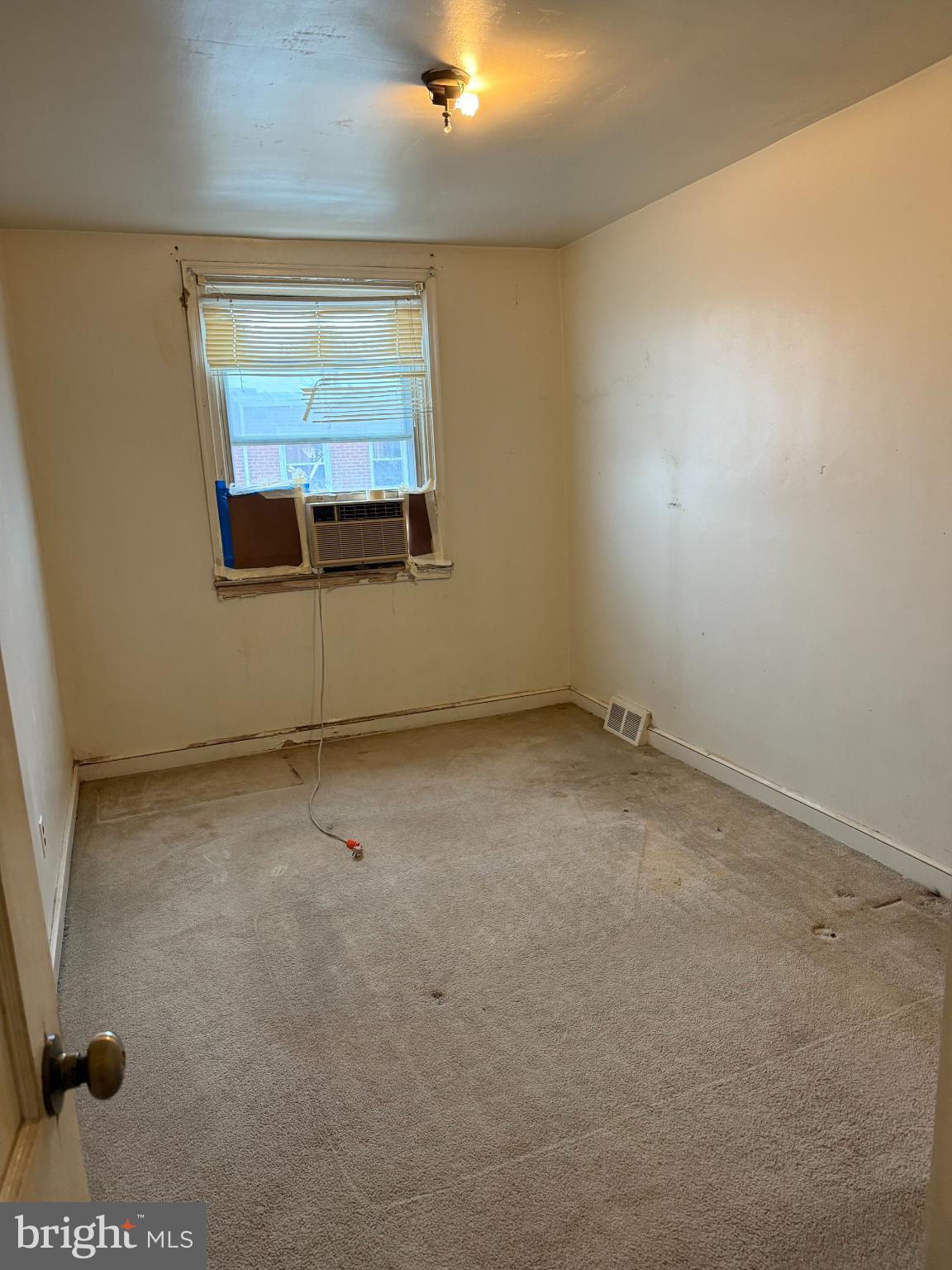 7151 Lynford Street Philadelphia, PA 19149 - Photo 9 of 13 an empty room with windows