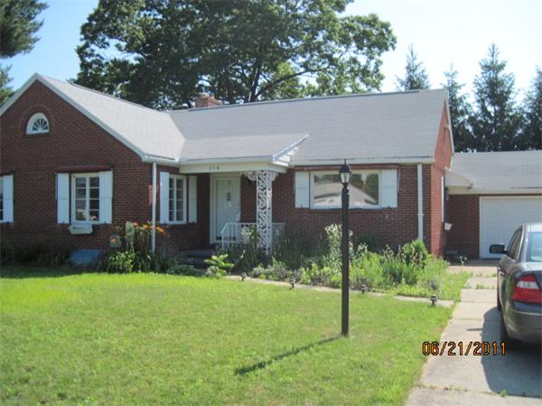 229 Oak Street Springfield, MA 01151 - Photo 1 of 10 a house view with a garden space