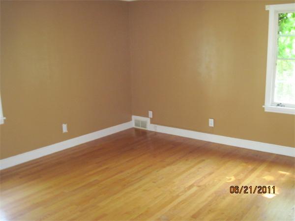 229 Oak Street Springfield, MA 01151 - Photo 6 of 10 a view of an empty room with a window