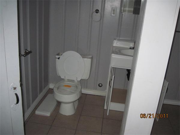 229 Oak Street Springfield, MA 01151 - Photo 10 of 10 a bathroom with a toilet and a sink