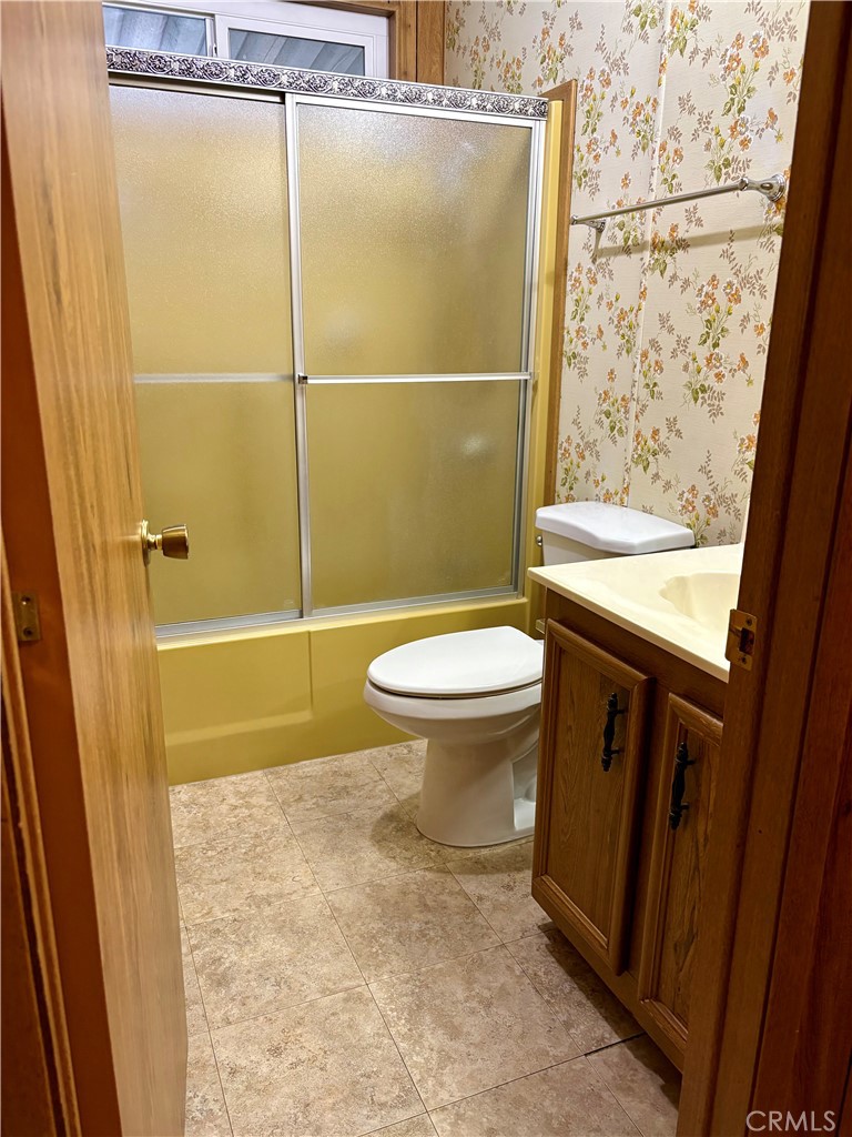 1901 Dayton Road, Unit 6 Chico, CA 95928 - Photo 15 of 25 a bathroom with a granite countertop sink toilet and shower