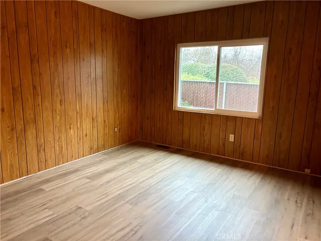 a view of entryway with wooden walls