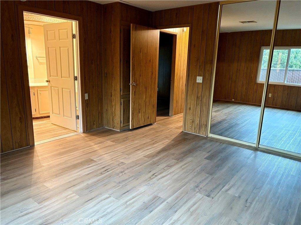1901 Dayton Road, Unit 6 Chico, CA 95928 - Photo 18 of 25 an empty room with wooden floor and a window